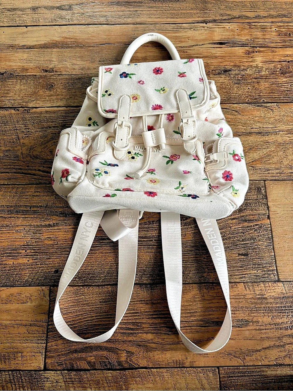 Steve Madden NYC White Floral Embroidered Buckle Flap Backpack
